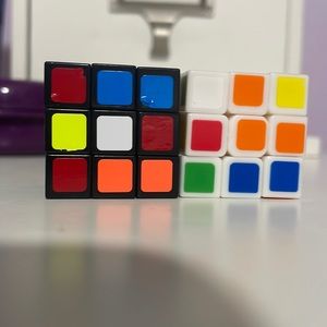 A black and white fidget puzzle rubix cube